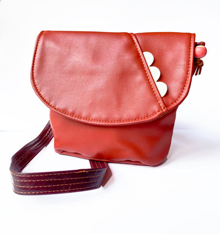 The Kelice adjustable cross body bag made from recycled materials - Sunset