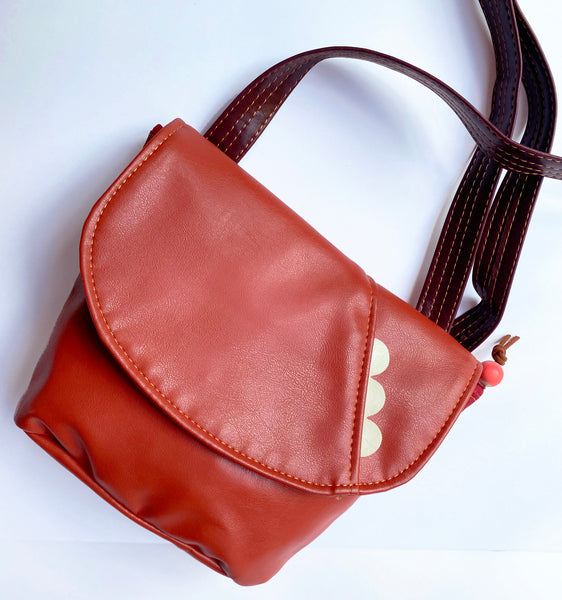 The Kelice adjustable cross body bag made from recycled materials - Sunset