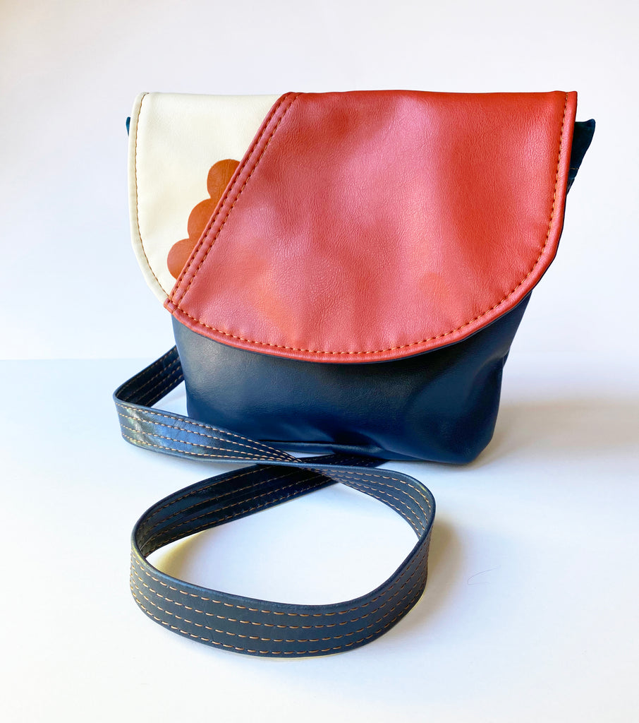 The Kelice adjustable cross body bag made from recycled materials - Coral Sunset